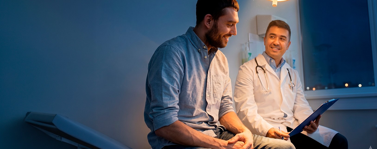 Doctor consulting with a male patient